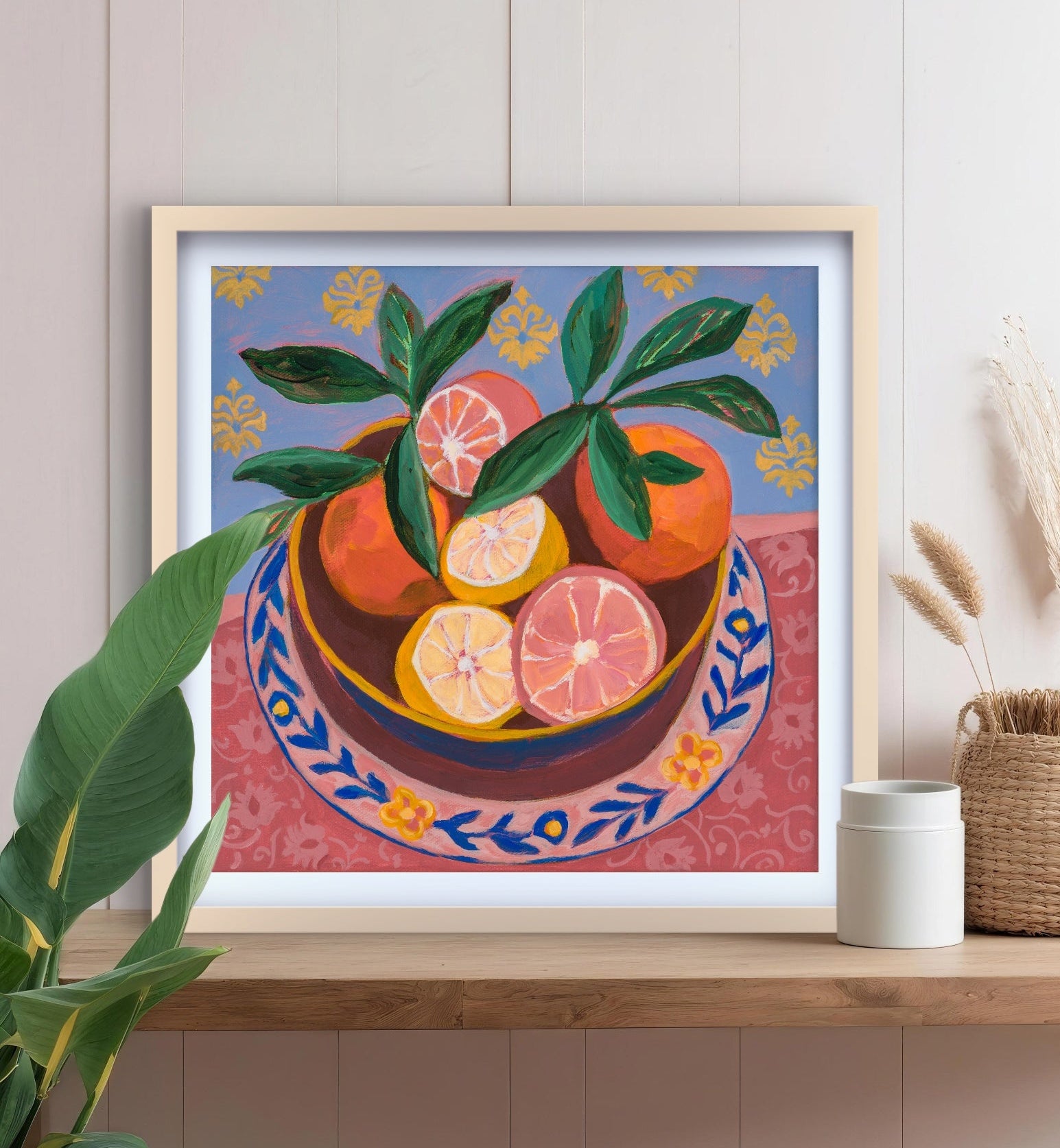 Framed artwork of a still life with fruits on a shelf.